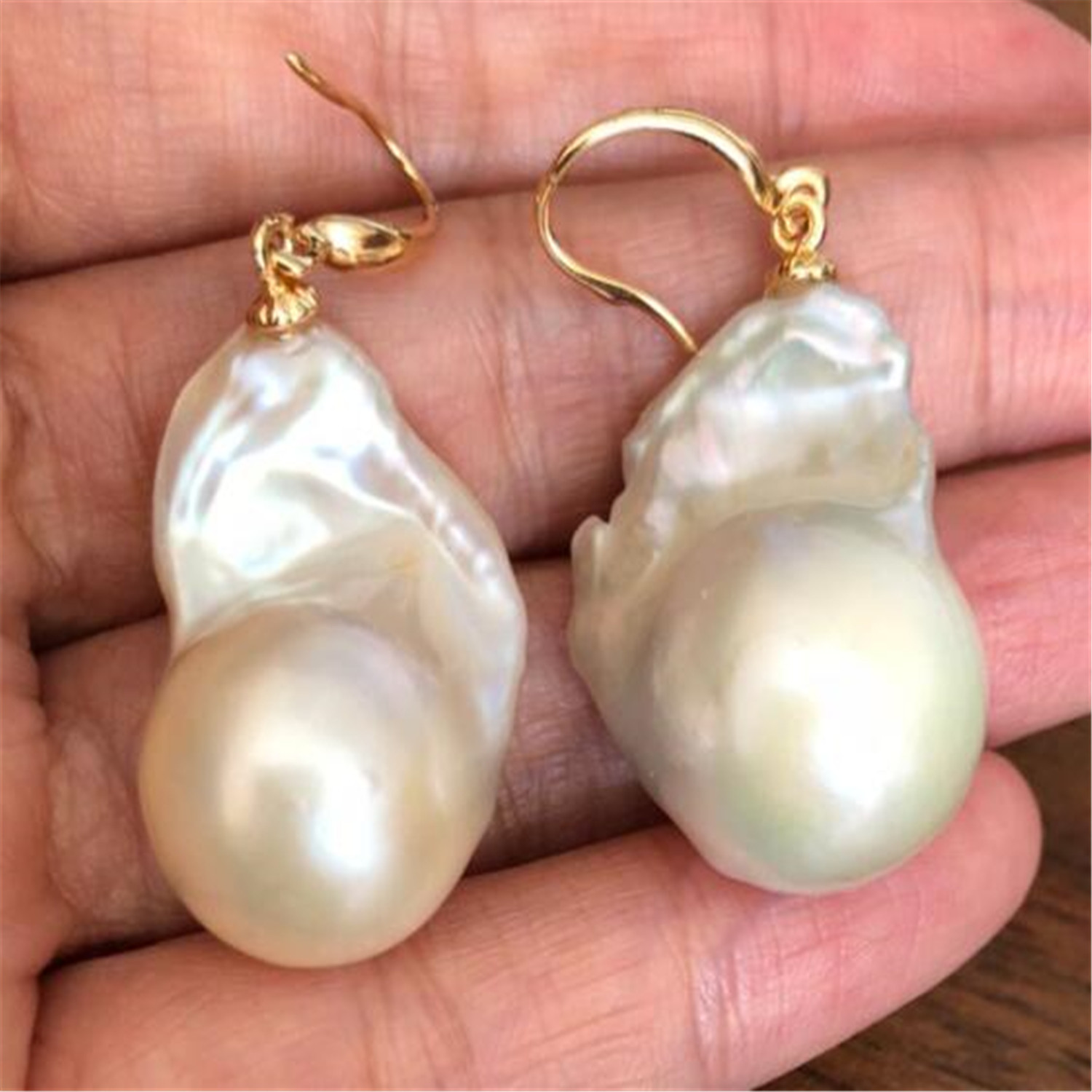huge pearl earrings