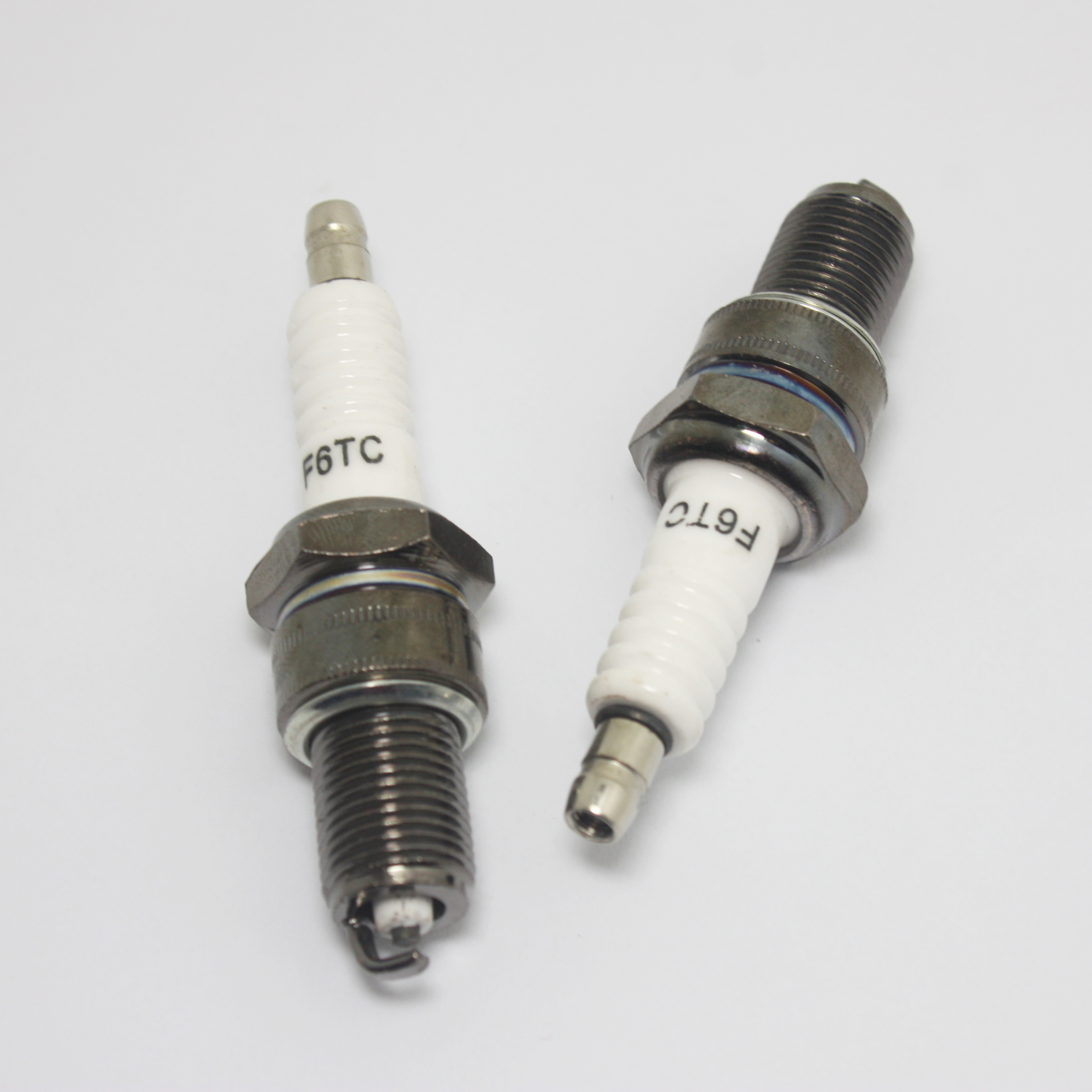 New High Quality F6TC Spark Plug For Strimmer Lawnmower Cutter Engine